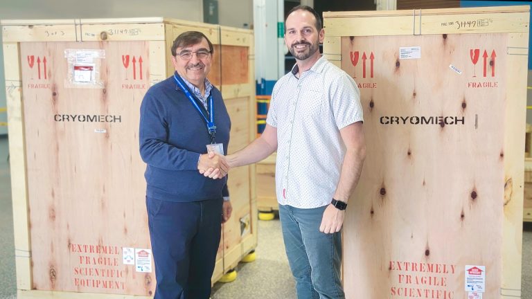 Dr Kenan Ünlü and Daniel Beck take delivery of a custom Cryomech cryostat for the Penn State College of Engineering, Radiation Science and Engineering Center.